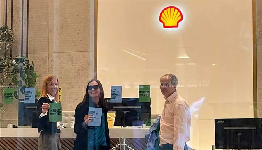 Extinction Rebellion activists glue themselves to the reception of Shell’s London HQ